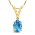 14K Yellow Gold 8X6Mm Oval Blue Topaz And Diamond Pendant