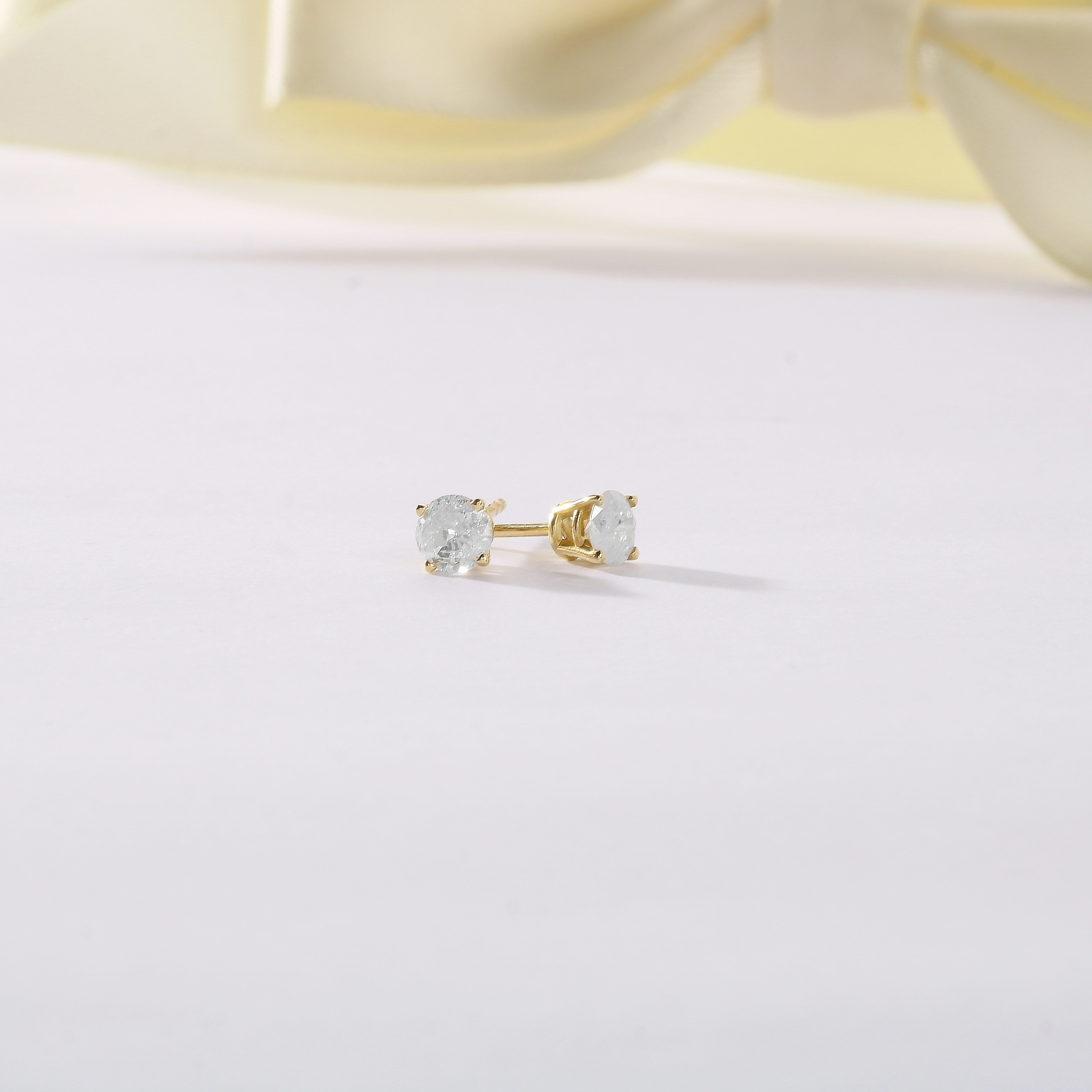 Igi Certified 14K Gold 1 4 Ct Tdw Diamond Solitaire Earrings
