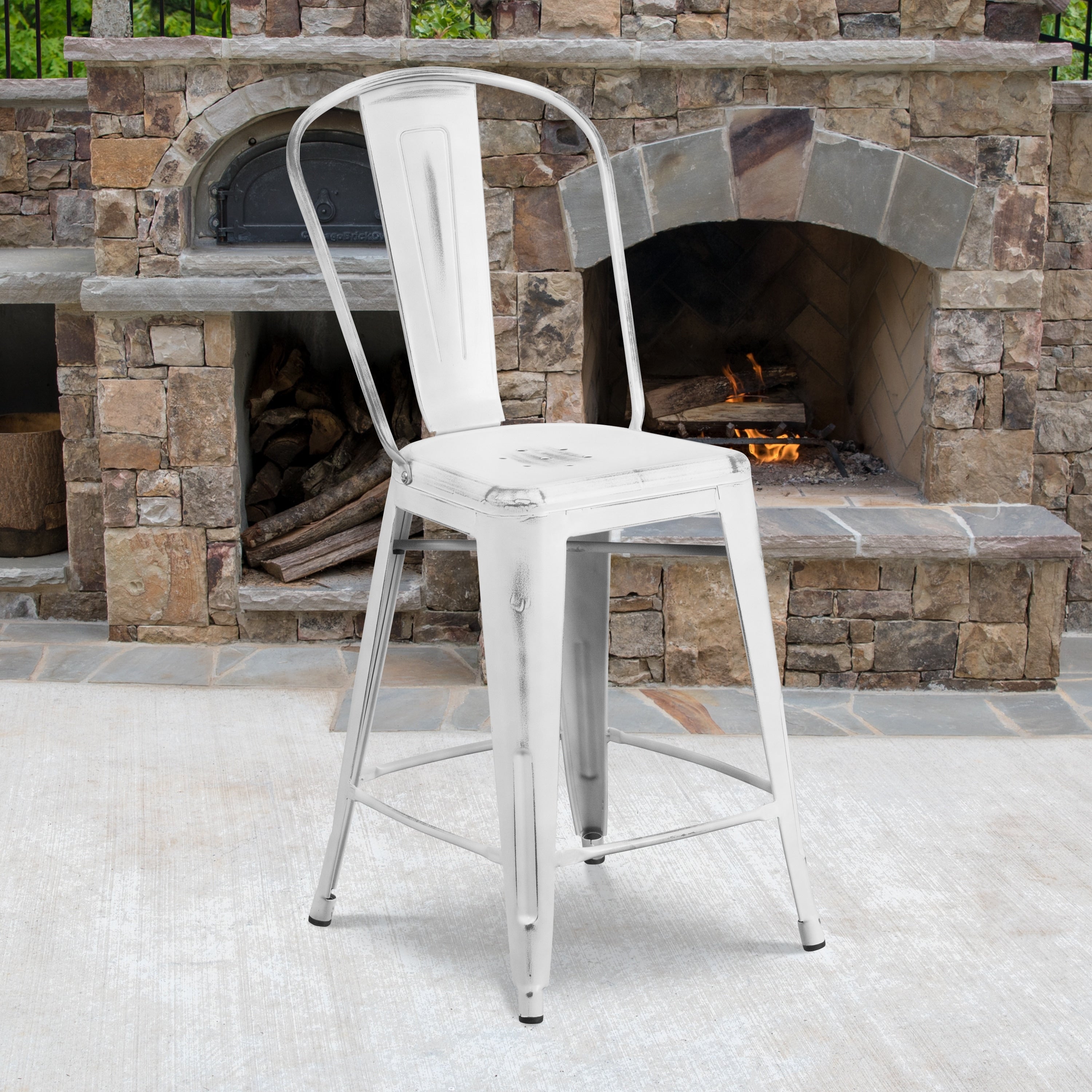 The Curated Nomad Joaquin Distressed Metal Indoor 24 Inch Counter Height Stool