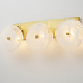 3 Light Mid Century Modern Brushed Brass Vanity Light With Cloud Textured Round Glass Glass Disc