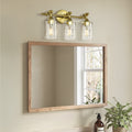 3 Light Wall Sconce With Clear Textured Glass Shades