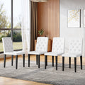 4 Pack Pu Dining Chairs Ergonomic Buckle Backrest 35 Inches High Black Metal Legs Combines Comfort And Texture