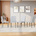 4 Piece Set Of Pu Dining Chairs Ergonomically Designed Buckle Backrest 35 Inches High Silver Metal Legs