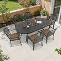 81.89In Oval Black Cast Aluminum Outdoor Dining Table With Unbrella Hole 6 Outdoor Chairs With Brown Cushions