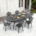 81.89In Oval Black Cast Aluminum Outdoor Dining Table With Unbrella Hole 6 Outdoor Dining Chairs Without Cushion