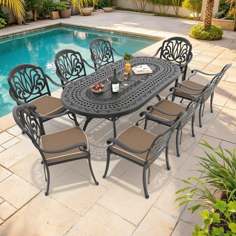 81.89In Oval Black Cast Aluminum Outdoor Dining Table With Unbrella Hole 8 Outdoor Chairs With Brown Cushions