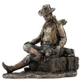 9.25 In H Cowboy And Dog Napping Figurine Poly Resin