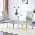 A Set Of 2 Vintage Crocodile Leather Cushioned Dining Chairs Featuring Crystal Clasp Design And Artificial Leather Design
