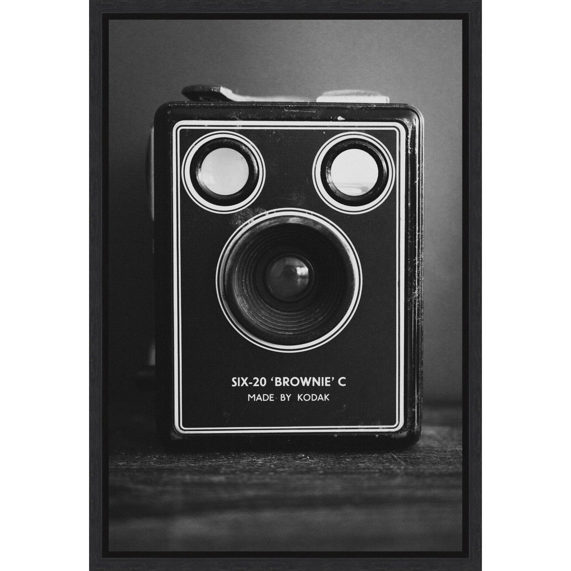 A Vintage Black And White Kodak Brownie By Christa Stroo Framed Canvas Wall Art