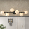 Acroma 6 Light Black Vanity Light With Globe Shades