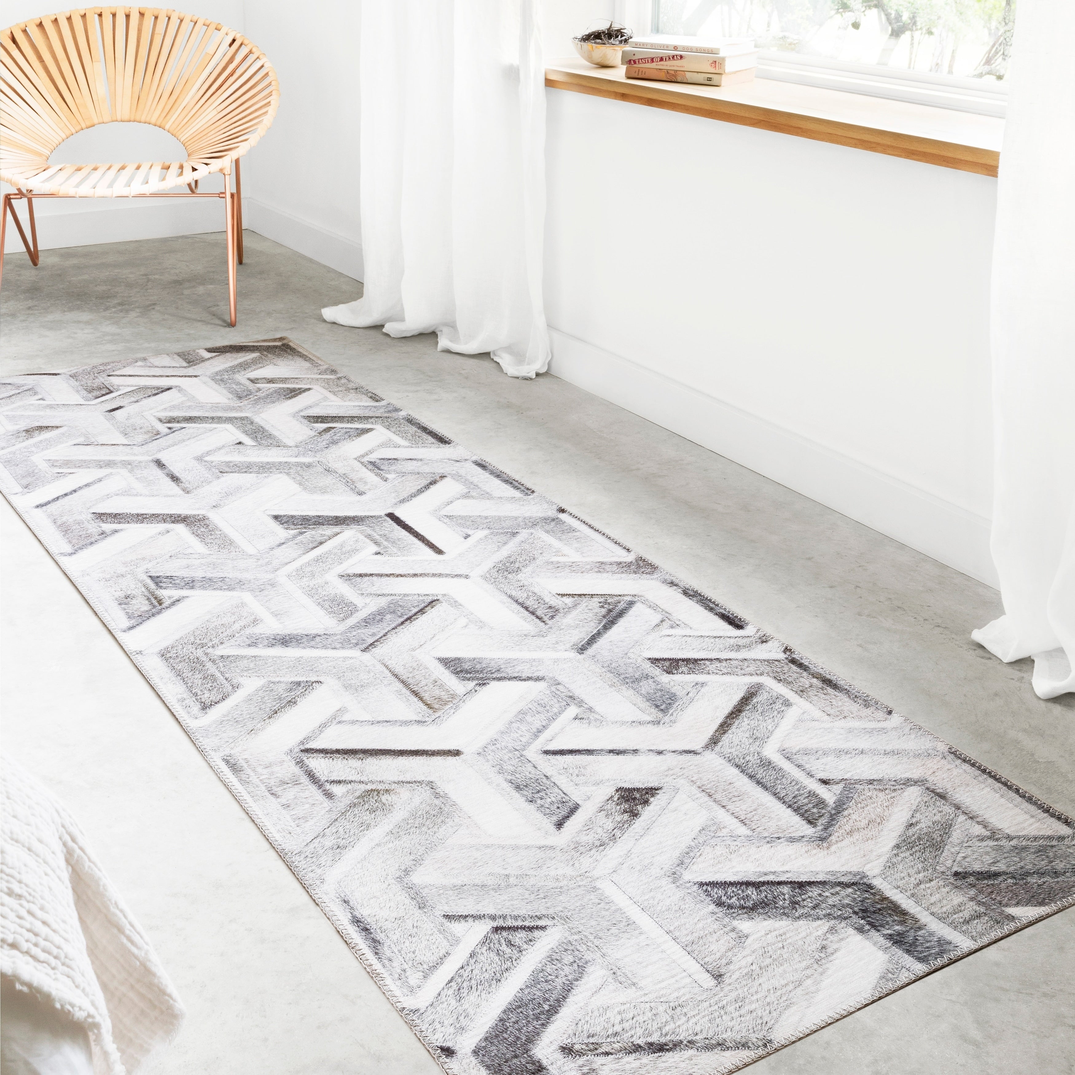 Alexander Home Davide Faux Cowhide Area Rug