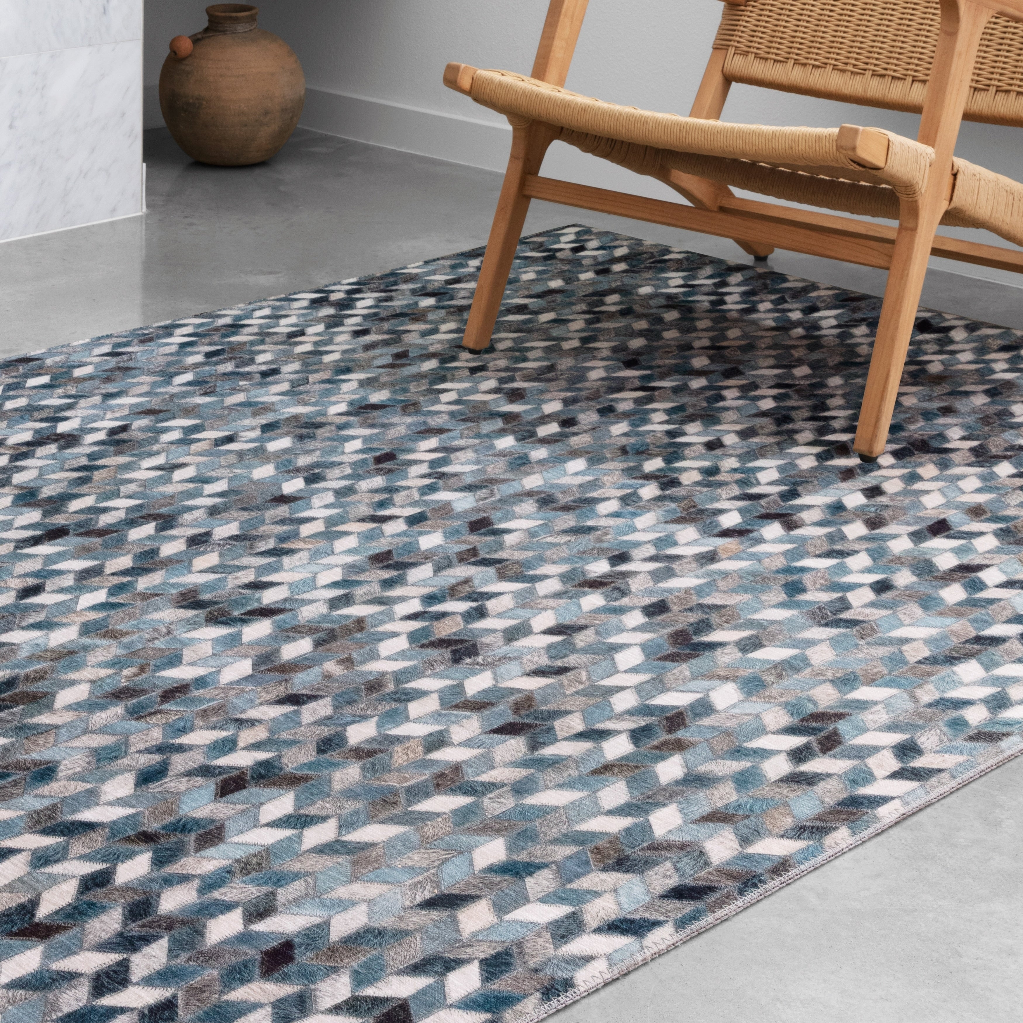Alexander Home Davide Geometric Faux Cowhide Area Rug