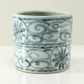 Approx. 8 Inches Tall Subtle Blue And White Pot With Floral Motif