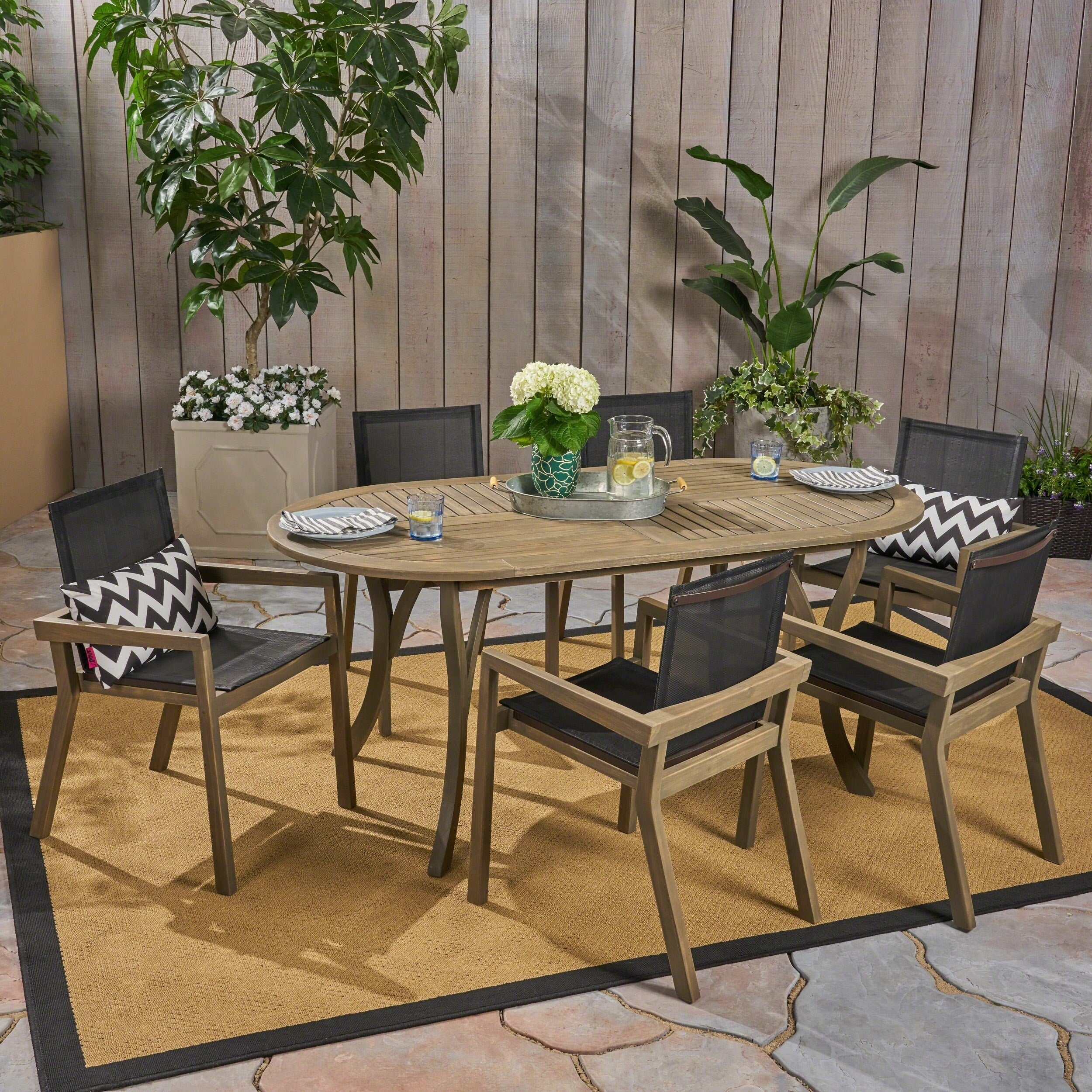 Arletta Outdoor 6 Seater Oval Acacia Wood Mesh Seats Dining Set By Christopher Knight Home