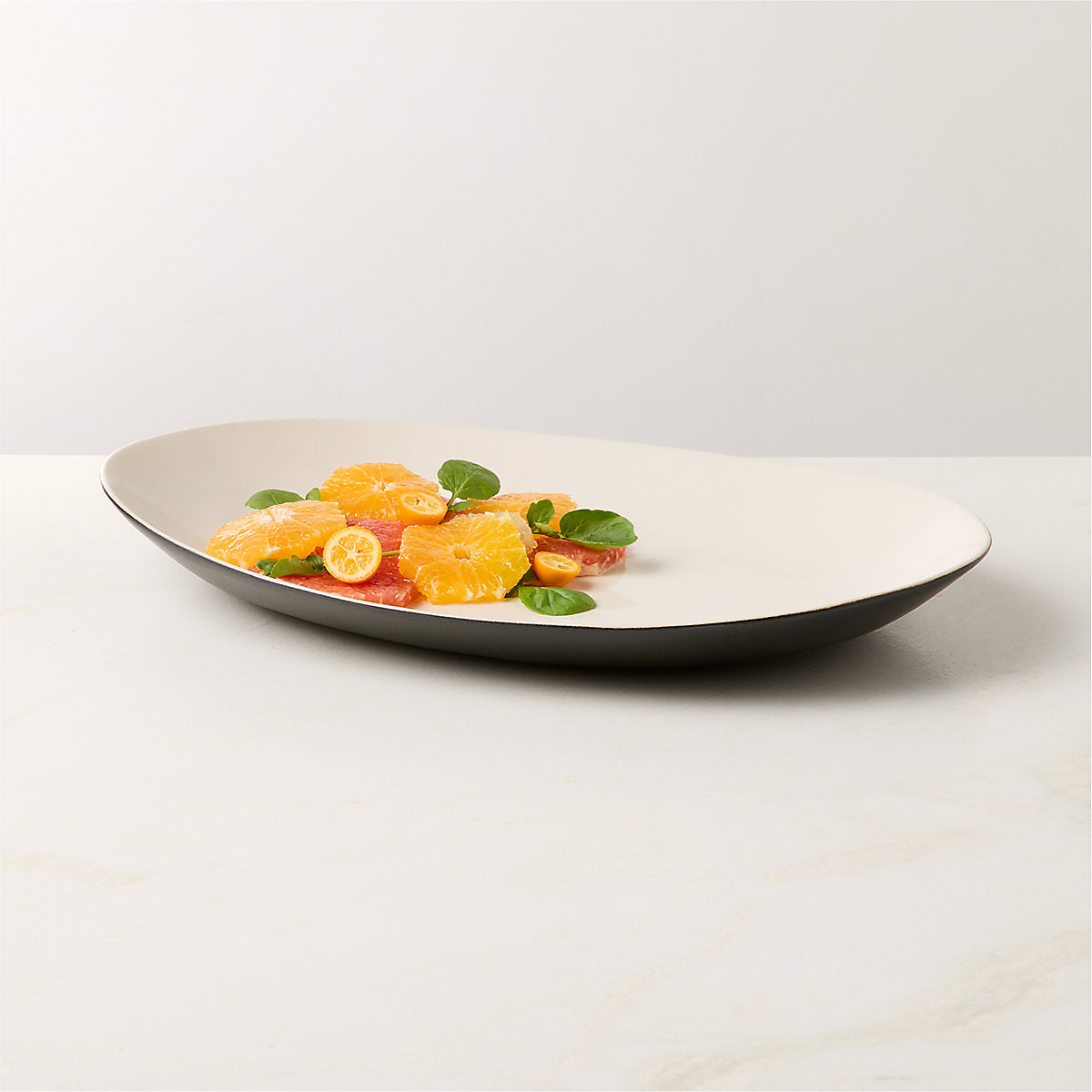 Barchan Black and Warm White Stoneware Serving Bowl by Kravitz Design