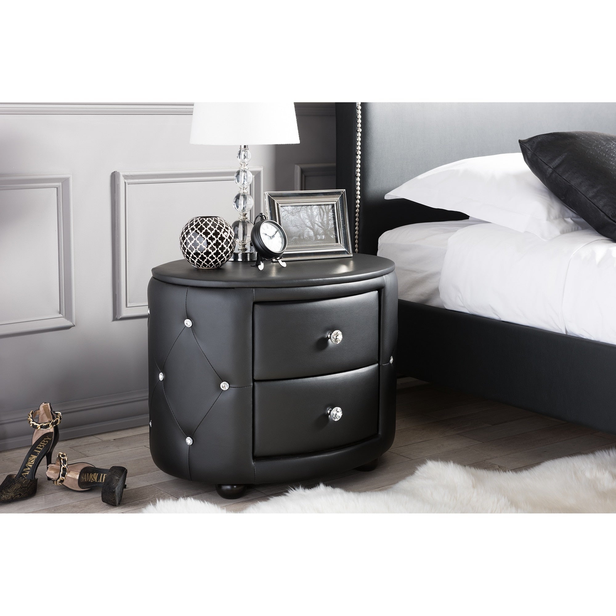 Baxton Studio Davina Hollywood Glamour Style Oval 2 Drawer Black Faux Leather Upholstered Nightstand