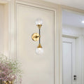 Black And Gold Metal Wall Sconces With Clear Glass Shades