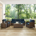 Bradenton 5 Piece Outdoor Wicker Set With Navy Cushions Sofa Two Arm Chairs Side Table Glass Top Table