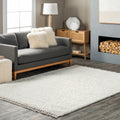 Porch Den Concho Solid Shag Tassel Area Rug