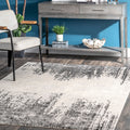 Carson Carrington Tomase Faded Tribal Chevrons Solid Area Rug