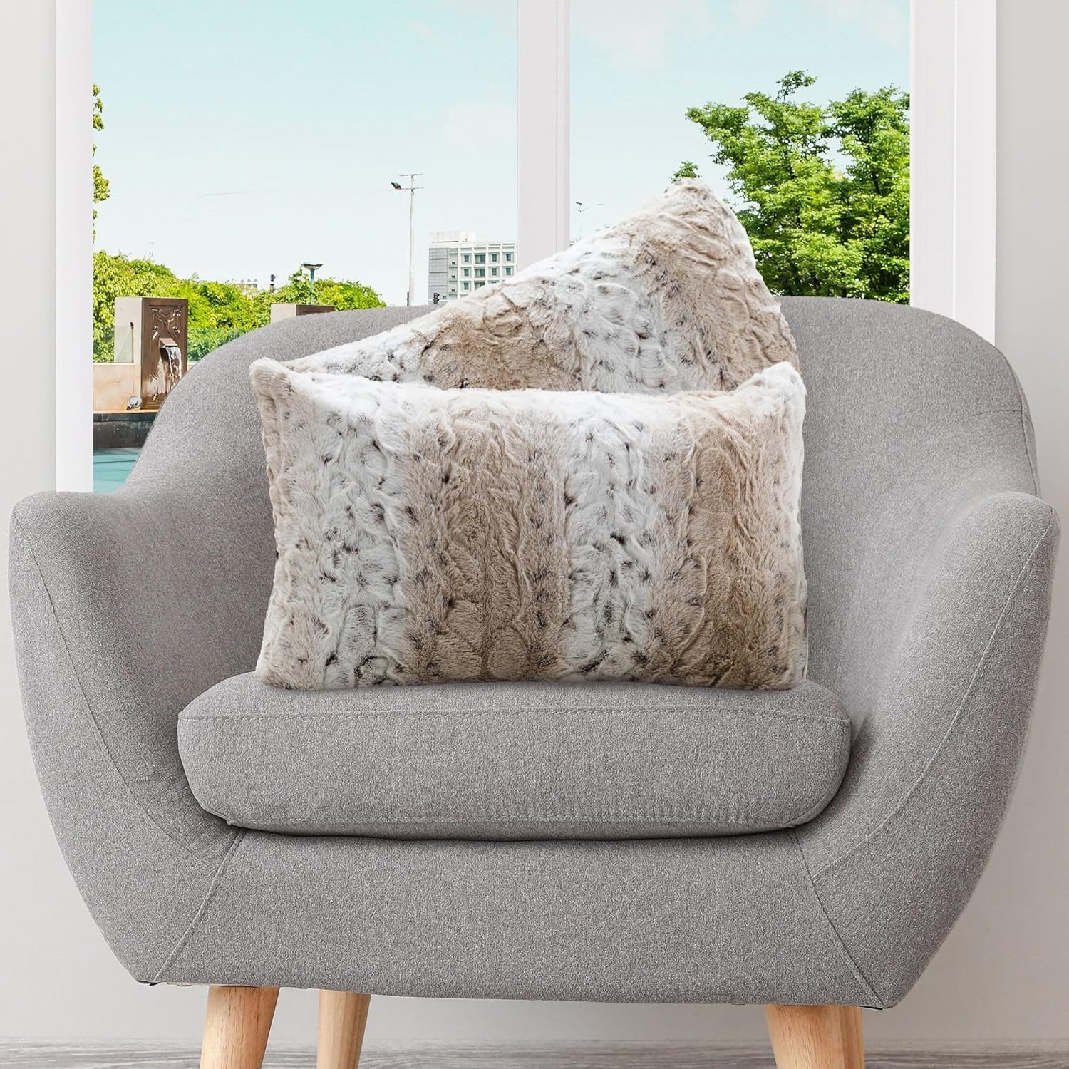 Cheer Collection Embossed Faux Fur Throw Pillows.