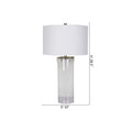 Clear Glass Base Table Lamp With A White Drum Shade