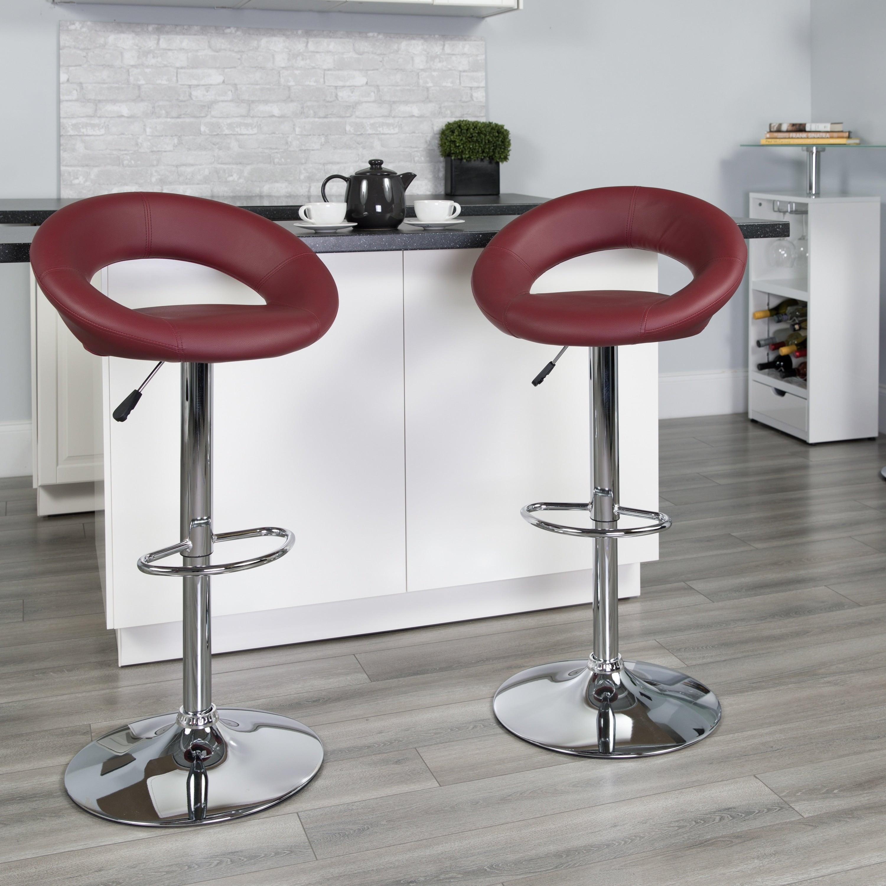 Carson Carrington Tune Upholstered Orbit Shape Swivel Bar Stool