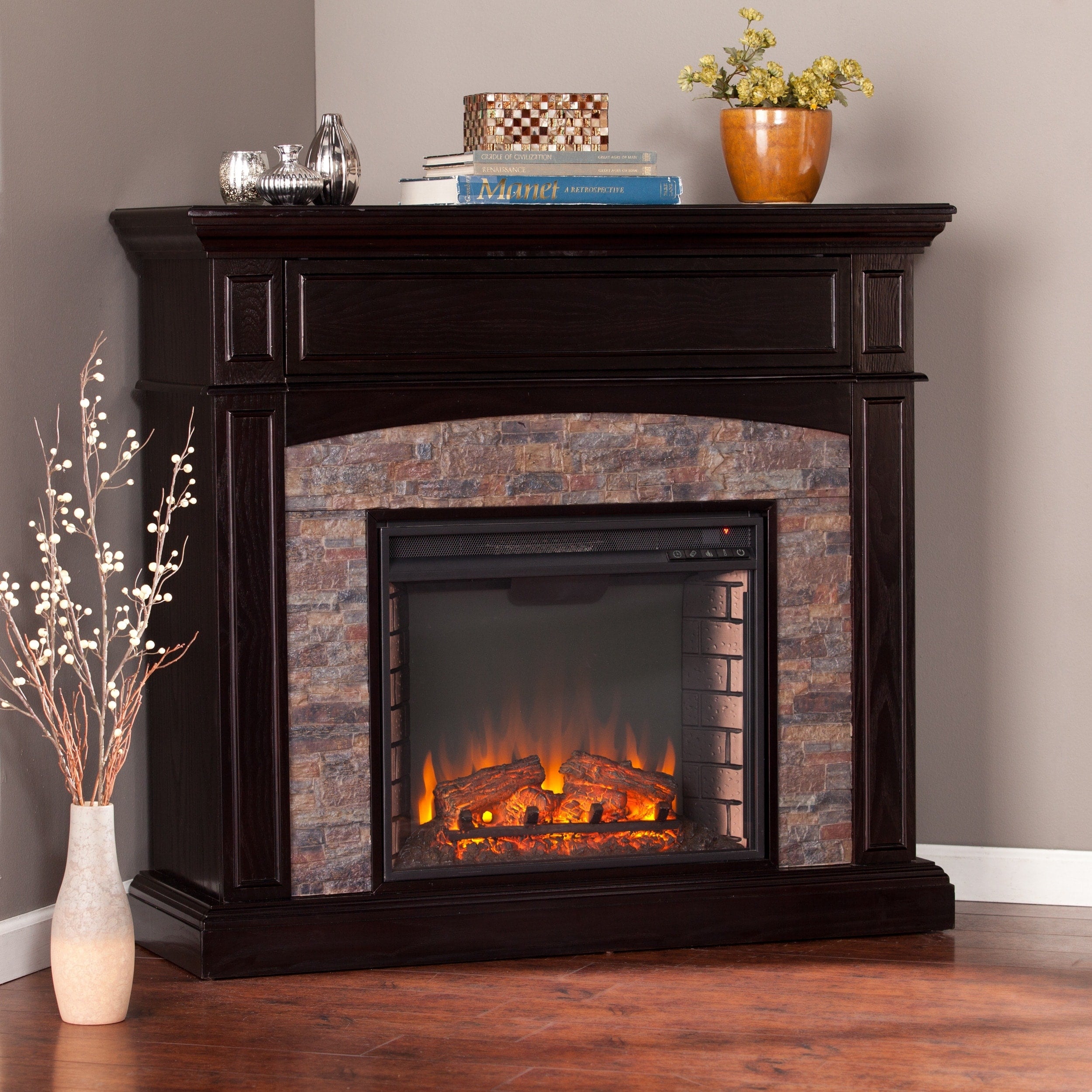 Copper Grove Amistad Ebony Faux Stone Corner Electric Media Fireplace