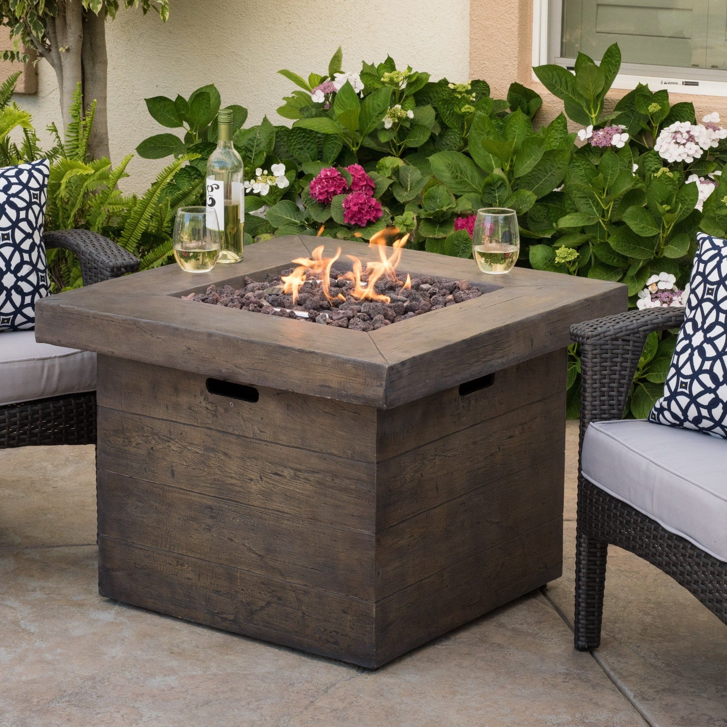 Dakota Outdoor Fire Pit With Lava Rocks By Christopher Knight Home