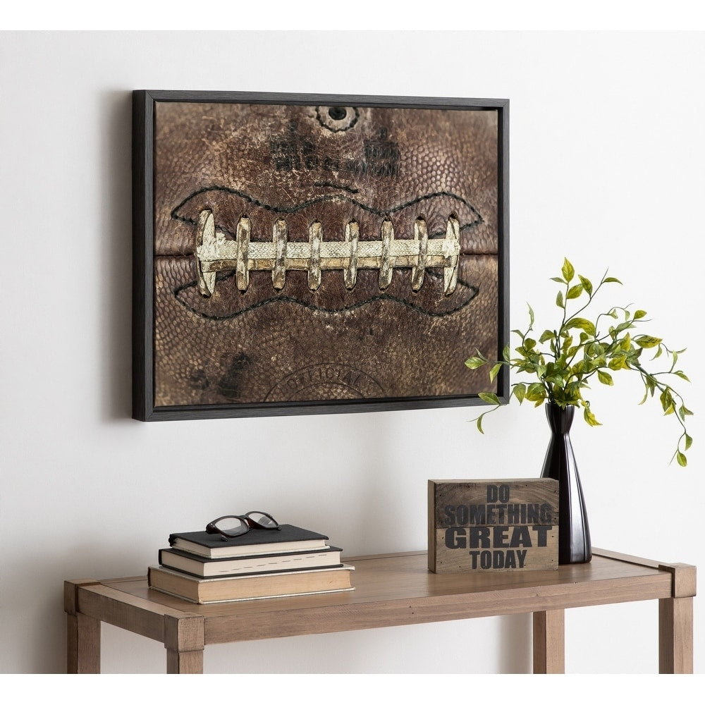 Designovation Sylvie Football Laces Framed Canvas By Shawn St. Peter