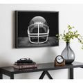 Designovation Sylvie Vintage Football Helmet Framed Canvas By Shawn St. Peter