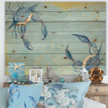 Designart Blue Coastal Crab Battle Nautical Coastal Print On Natural Pine Wood Blue