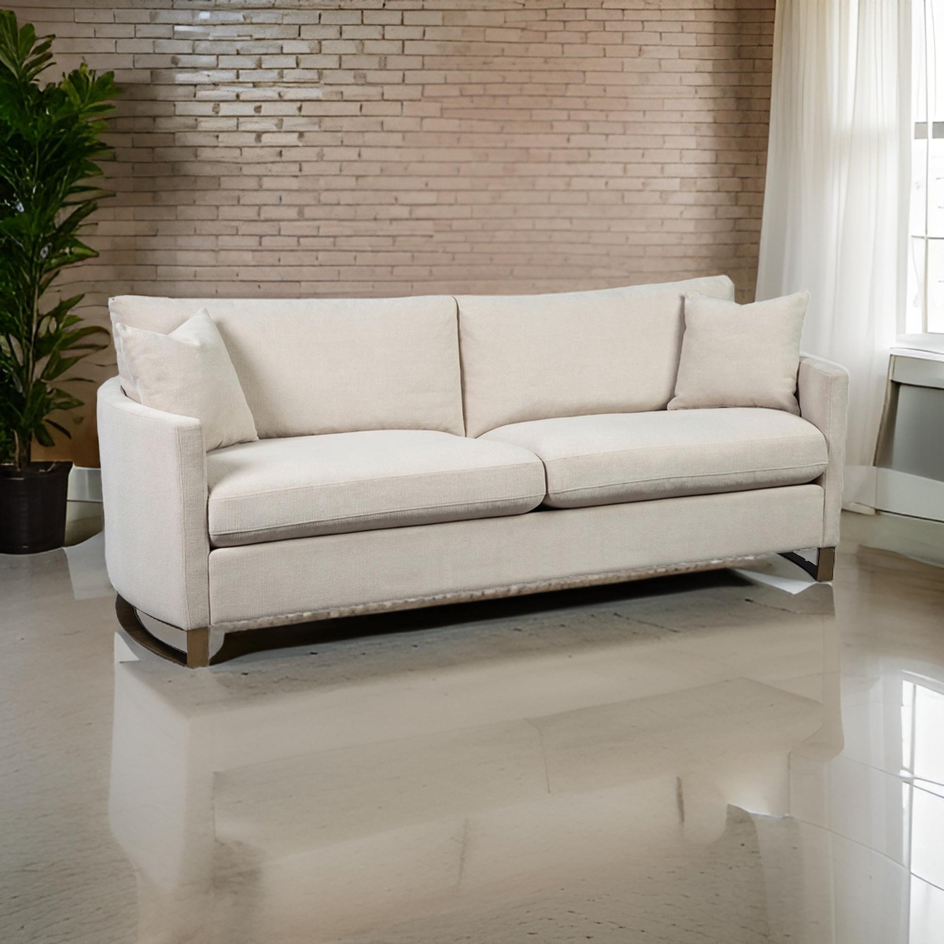 Fabric Upholstered Sofa With Metal Sled Base And Curved Armrests Beige