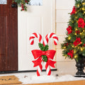 Glitzhome 24 H Christmas Polyresin Candy Cane Porch Decor