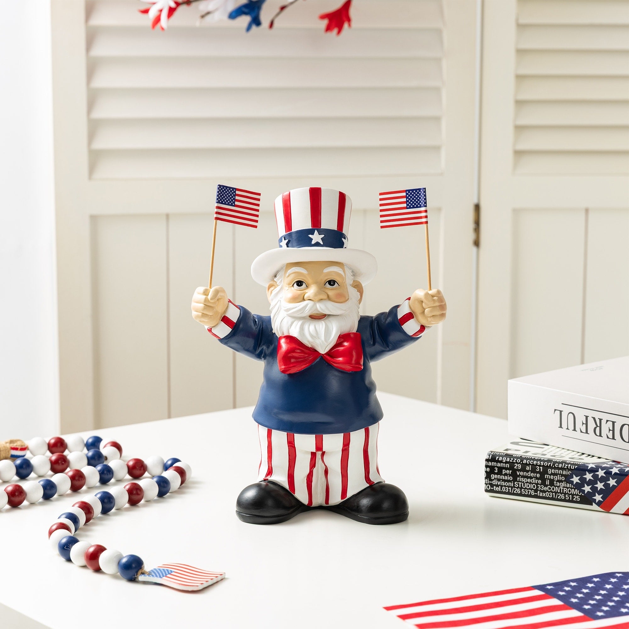 Glitzhome 9 H Patriotic Americana Polyresin Santa Holding Flags Table Decor