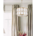 Gold Metal Drum Pendant With Geometric Shape
