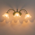 Green Metal Flower Frosted Glass Wall Sconce For Bathroom Vanity