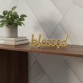 Homeroots 8 Gold Cast Iron Blessed Hand Painted Tabletop Sculpture 7.75 In. X 2.75 In. X 0.75 In.
