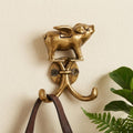 Homeroots Two Hook 2 Antiqued Gold Cast Iron Pig Wall Hooks 2.38 In. X 3.00 In. X 0.50 In.
