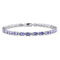 Miadora Sterling Silver Tanzanite And White Topaz Bracelet