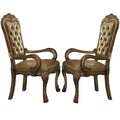 Leatherette Upholstered Arm Chair With Intricate Carvings Set Of 2 Gold