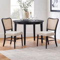 Leena Black Wood Dining Chairs Ivory Rattan Back And Upholstered Fabric Seat Set Of 2
