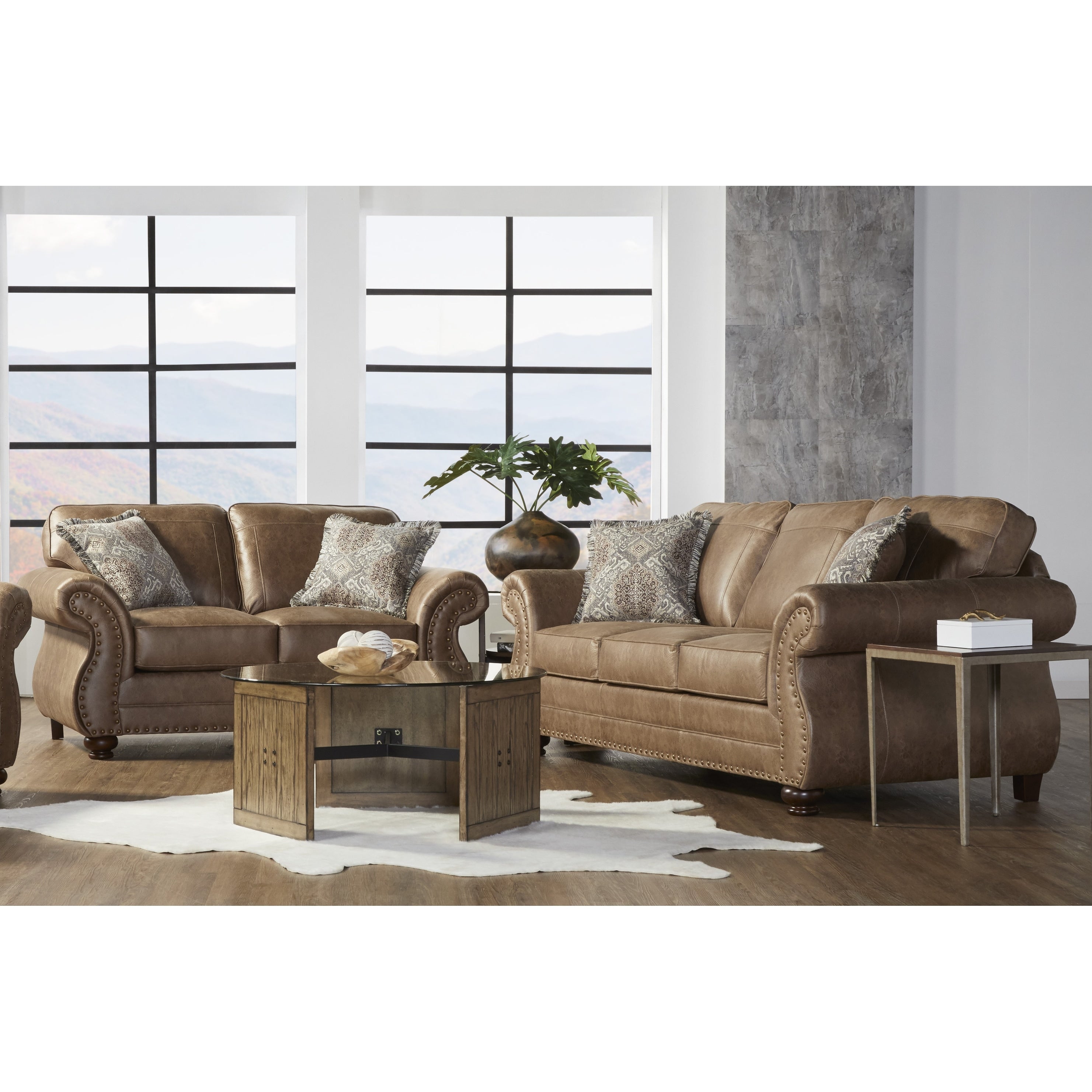 Leinster Faux Leather Sofa And Loveseat With Antique Bronze Nailheads In Jetson Ginger