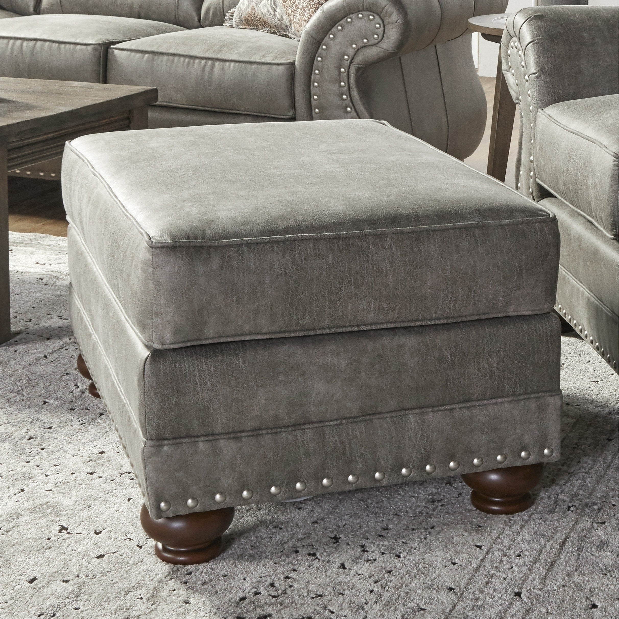 Leinster Faux Leather Upholstered Nailhead Ottoman In Stone Gray