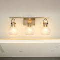 Mansfield 24 Inch 3 Light Champagne Gold Vanity Light With Clear Glass Shades