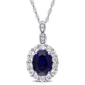 Miadora 14K White Gold Oval Cut Created Blue Sapphire White Topaz And Diamond Accent Halo Necklace