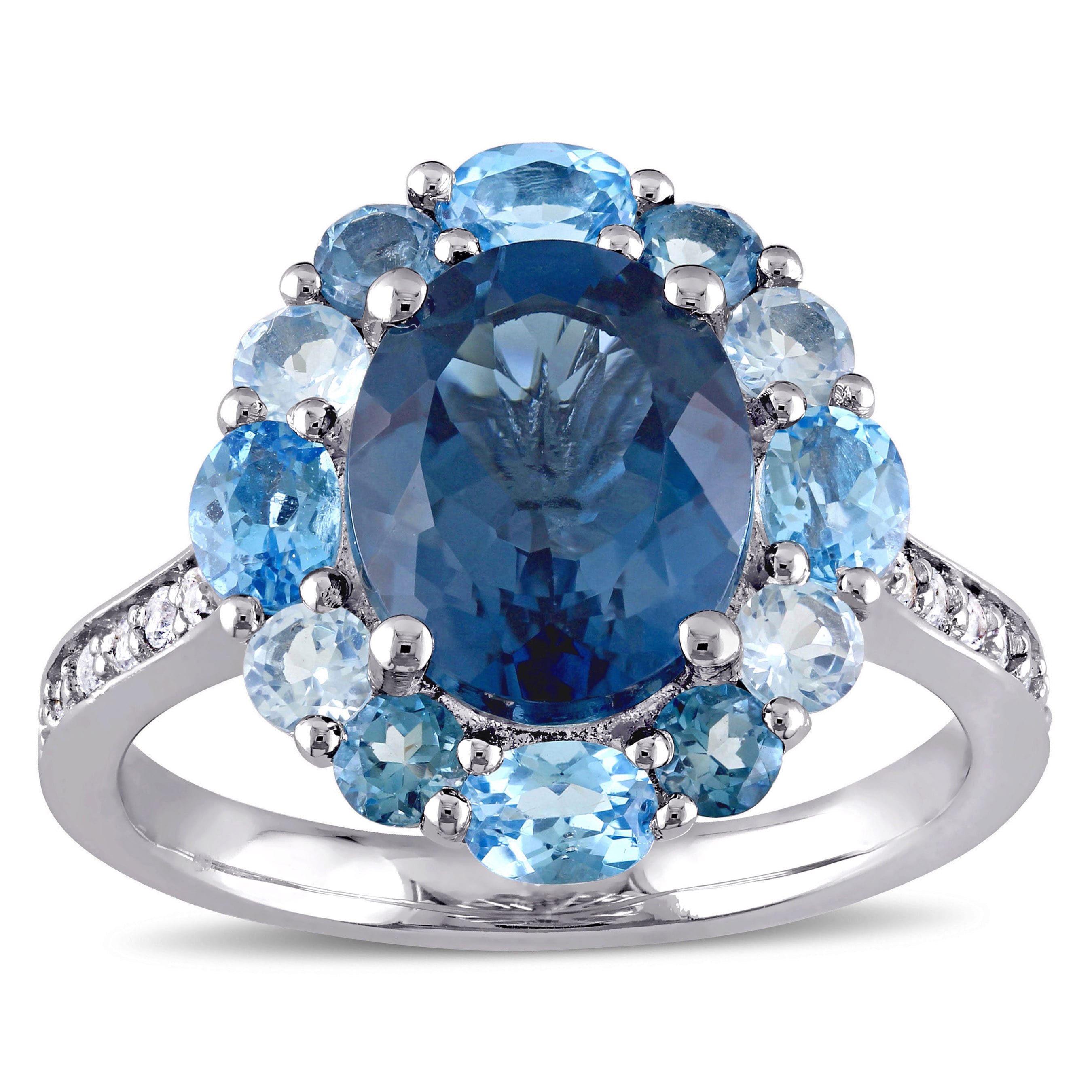 Miadora Sterling Silver Oval Cut Blue And White Topaz Halo Cocktail Ring