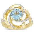 Miadora Yellow Plated Sterling Silver Sky Blue And White Topaz Swirl Halo Ring