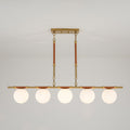 Modern French 5 Light Linear Chandelier In Brushed Brass With Textured Lychee Rods And Opal Globe Shades