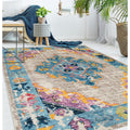 The Curated Nomad Rincon Floral Distressed Fuchsia Rug